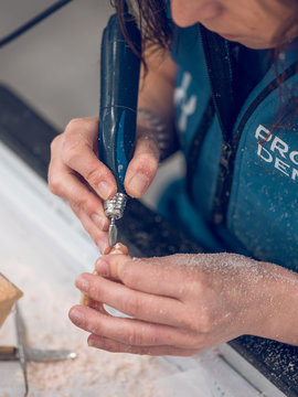 Dental Technician Polishing Teeth