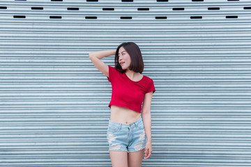 Portrait of asian woman sit on the road,Beautiful thailand people,Happy woman concept,Lifestyle of modern girl