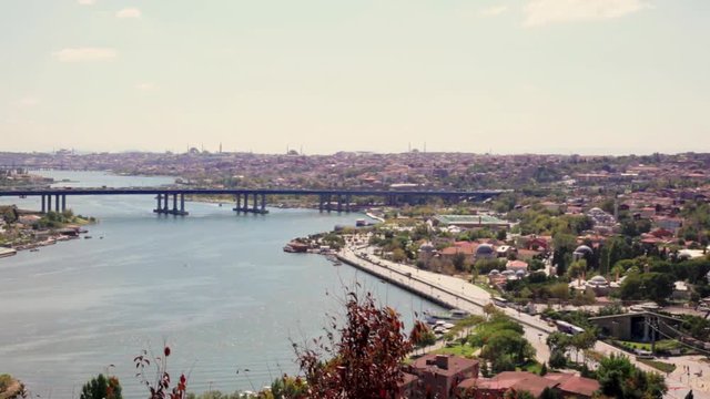 Cemetery Sultan Eyup, The Halich Bridge and panoramic view of the Golden Horn Bay in Istanbul, Turkey.
