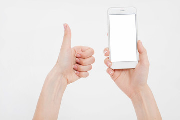 Hand holding white phone isolated on white clipping path inside. Top view.Mock up.Copy space.Template.Blank.