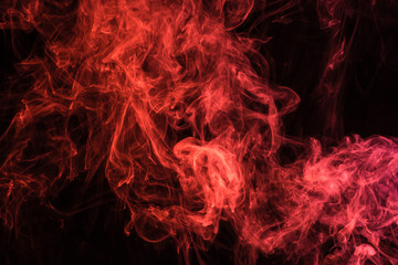 red mystical smoke on black background