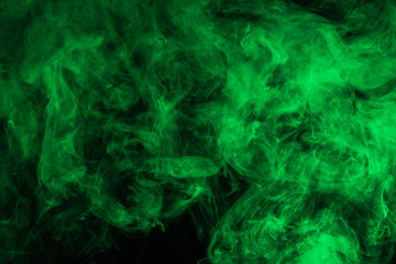 abstract background with green smoke on black