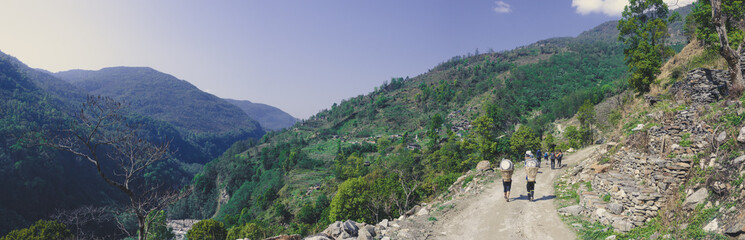 Fototapeta na wymiar The road in the mountains of Annapurna range, Nepal Himalayas