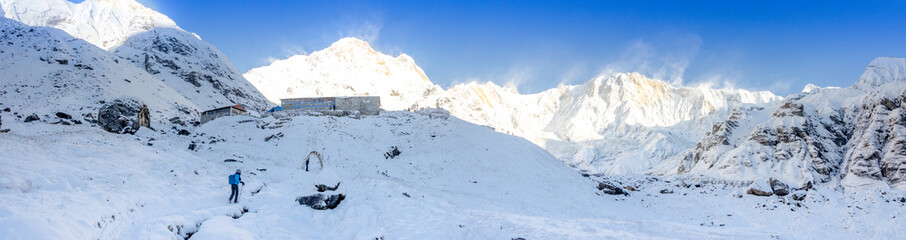 Panorama of snow and mountain Range Landscape with Blue Sky from Annapurna range, Nepal Himalayas.