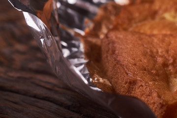 apricot cake on a dark wood background. tinting. selective focus