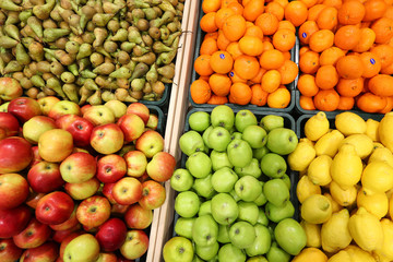 Counter with fresh fruit in the supermarket