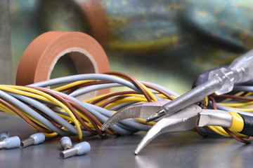 Components and tool for use in electrical installations