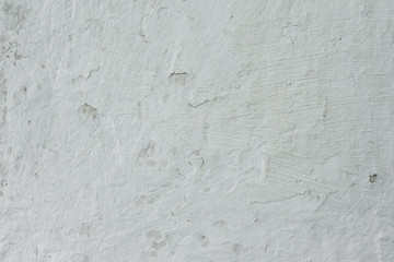 Wall fragment with scratches and cracks