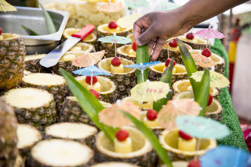 Fresh Tropical Pina Colada cocktail served in a pineapple