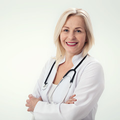 Smiling medical woman doctor. Isolated over white background
