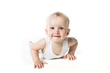 Cute baby on the ground isolated on white background