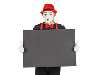 happy MIME artist holding a blank white Board, on a white background.
