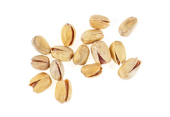 Heap of salted pistachio nuts isolated on white background