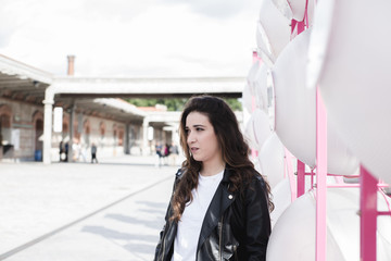 Girl in white shirt and fur jacket