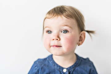 Portrait of a young girl on photo studio