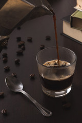 Coffee and books on table