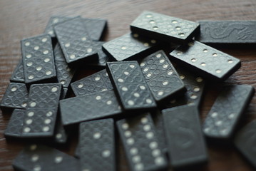 black domino on a wooden background        