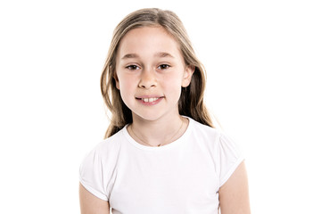 Portrait of cute, confident 9 years old girl, isolated on white