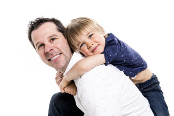 Father and his five years blond son together isolated on white