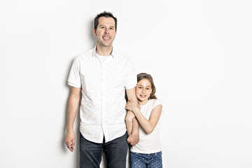 girl with his father, isolated on white wall