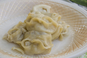 Oriental cuisine,manti are on the plate