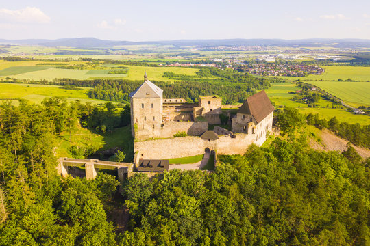 Aerial view of castle Tocnik. Gothic fortress from 14th century. Famous tourist attractions in Czech republic, European union.