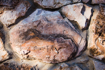 Close up of natural stone wall. Stone wall texture 