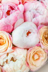 Fototapeta na wymiar Fresh bunch of pink peonies and roses
