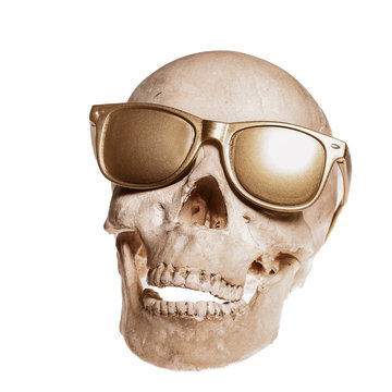 skull with golden sunglass isolated on white background