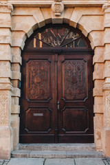 Fototapeta na wymiar old wooden doors of european building, Wroclaw, Poland
