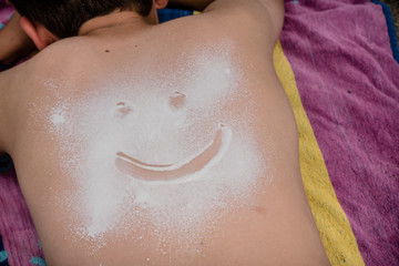 Fototapeta premium sunscreen on the body