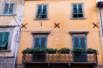 Fototapeta na wymiar Old Italy windows and wall background texture.