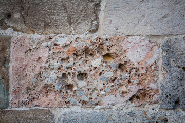 The texture of the old wall.