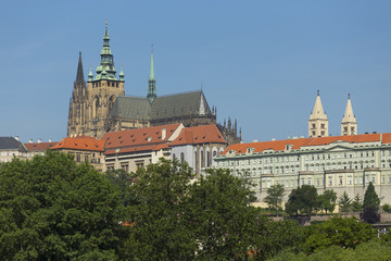 Spring Prague gothic Castle with the Lesser Town above River Vltava in the sunny Day, Czech Republic