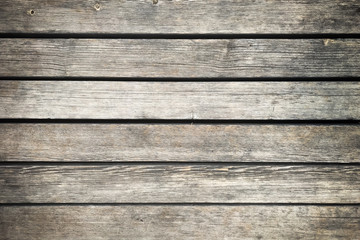 Wooden background with grey horizontal planks. Old and rough wood texture