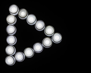 White lights play button icon