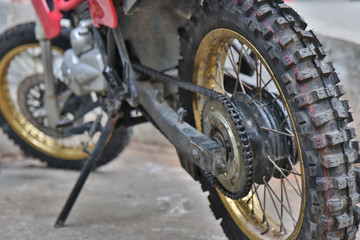 Close-up of muddy rear wheel
