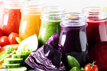 Food and drinks, selection of healthy and useful colorful vegetable juices and smoothies with chia...