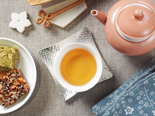 Chinese tea set with refreshments on the table