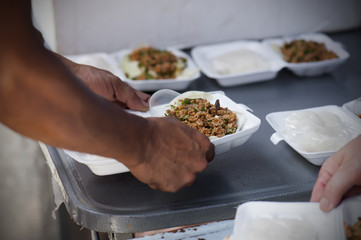 Feeding the poor to help each other in society. Charity concept