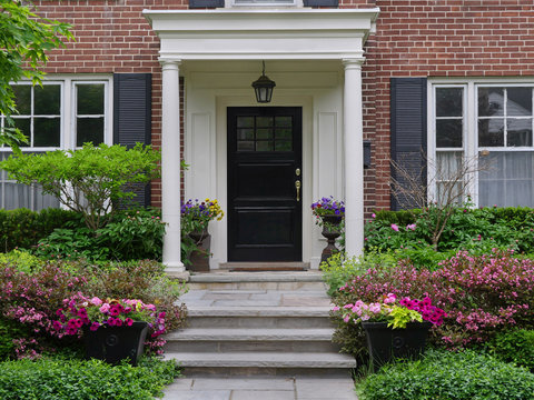 front door of house with portico entrance