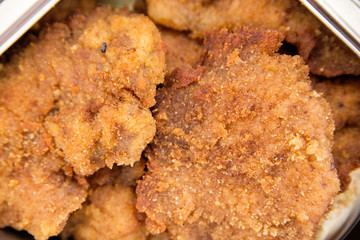 Fillet, breaded meat in marmite