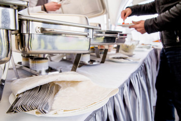 The work of the catering service. Food serving in Marmite