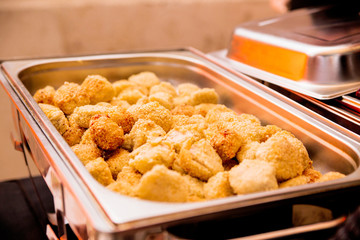 potatoes in sesame seeds in marmite