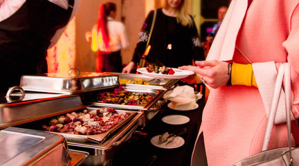 serving marmite food at a party