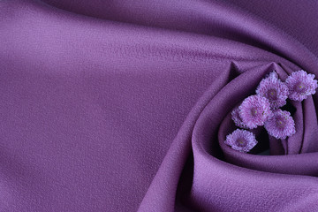 Purple clothes with flowers


