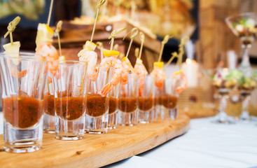snack - a glass of sauce and shrimp