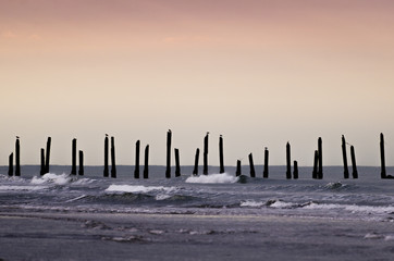 Sunset over the broken pier