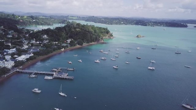 Aerial, boating in Russell New Zealand, former capital and beautiful beach holiday destination.