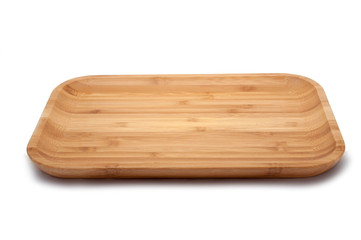 Empty wooden natural dish isolated on the white